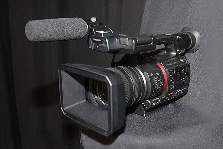 Panasonic AG-CX350 UHD 4K Camcorder with 20x Optical and 32x Intelligent Zoom. Panasonic AG-MC200G Unidirectional Microphone.