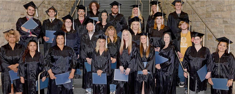 Adult basic education students graduating with their high school equivalency (HSE) diploma.