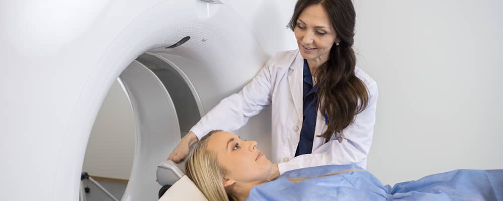Health Care Studies student guiding a patient during MRI appointment