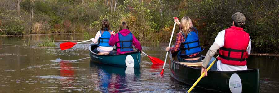 Students in canoes paddling at the Muller Field Station