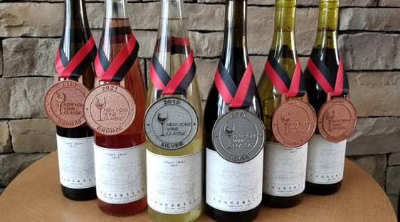 The 2019 Foundation vintage displayed with two silver and four bronze medals from the New York Wine Classic.